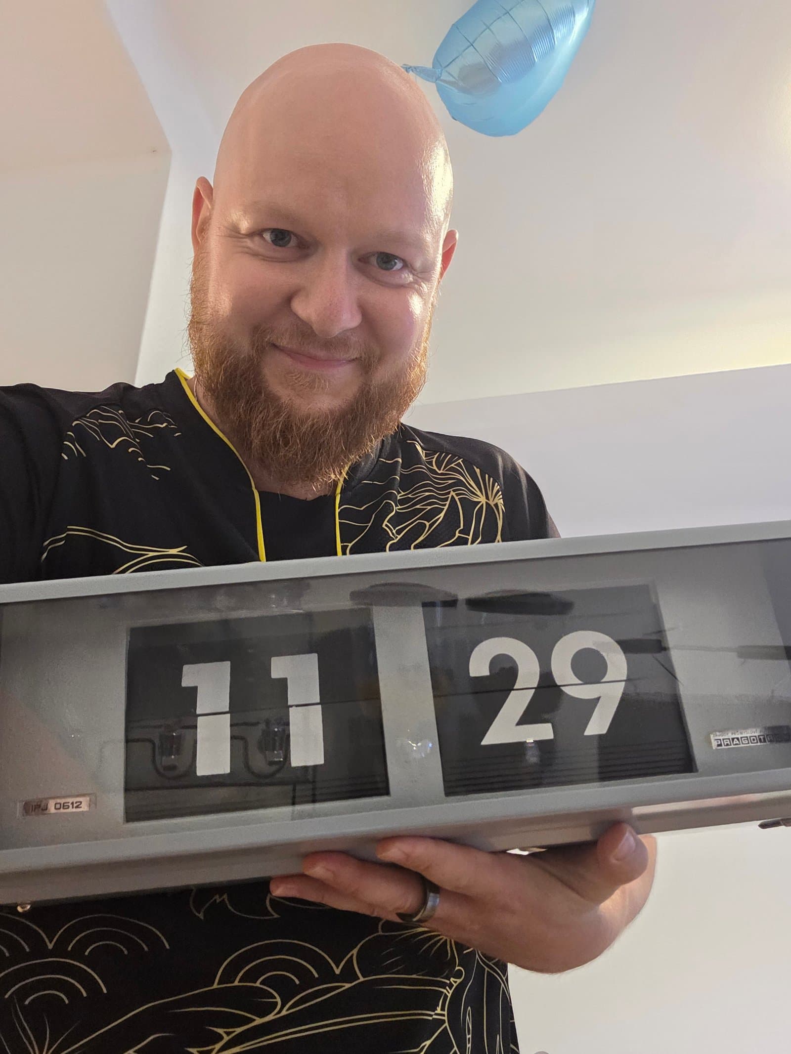 Vojtěch Košák s Pragotron hodinami